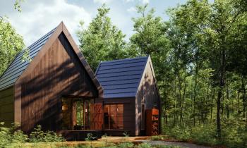 Vue sur 2 tiny houses en bois dans la forêt