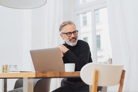 Smiling businessman looking to the side