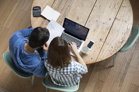 Young couple checking their finances